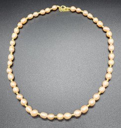 Peach Freshwater Pearl Necklace In Gold Tone