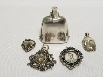 Five Sterling Silver Pendants