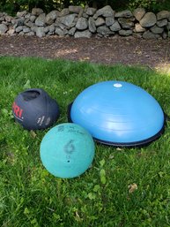 2 Medicine Balls And A Bosu Balance Trainer