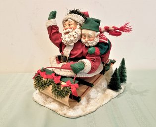 Vintage Clothtique Santa And Elf On A Taboggan  By Midwest Imports