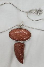 18' Silver Plated Chain With A Goldstone Double Pendant