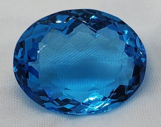 Enormous 80.00 Carat 32.20mm X 25.40mm X 15.45mm Lab Created Blue Topaz