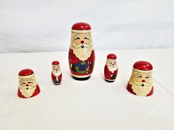 Vintage  Hand Painted Wooden Santa Nesting Dolls By Lillian Vernon