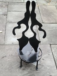 Black Metal Abstract Sculpture Of Mirror Images Includes Black Plant Stand
