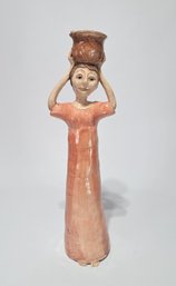 Woman Carrying Bird In Basket Ceramic Statue