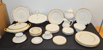 Variety Of Different Patterned White And Gold China