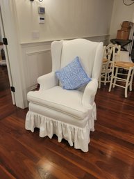 White Skirted Wingback Chair In Great Shape.- - ------------Loc: Garage