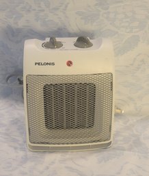 Pelonis Heater.  Model NT20-12D- - - - - - - - - - - - - - - - - -- - - - - - - - - - - - - - - - - - - S1