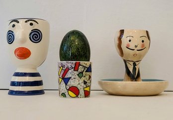 Trio Of Vintage Egg Coddlers,Gaudi, Mustache Man And Face With Tongue Sticking Out, Signed Illegibly