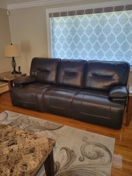 Brown Leather Reclining Couch.  Power Recline And USP Ports On Both Ends.