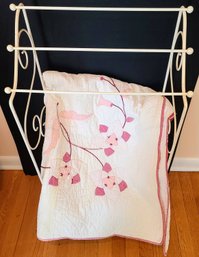 White Metal Quilt Stand And Vintage Pink And White Quilt