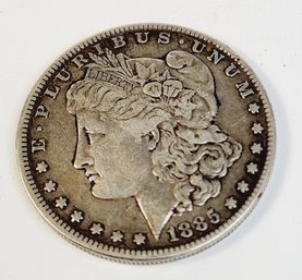 1885-p  Morgan Silver Dollar