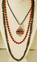 Art Glass Pendant Paired With Red Bead And Hematite Multi-strand Necklaces