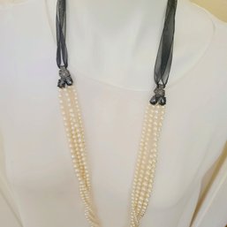 Multistrand Seedpearls With Silk And Rhinestone Cord