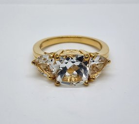 White Topaz 3 Stone Ring In Yellow Gold Over Sterling