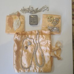 Collection Of Antique And Vintage Rhinestone Necklaces Pins, And Satin Toiletry Bags