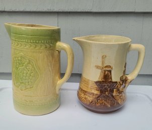 Antique Majolica Pitcher With Windmills Paired With Antique Grape Cluster Pitcher