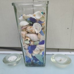 Glass Vase With Shells And Beach Glass Paired With Two Glass Tea Light Holders