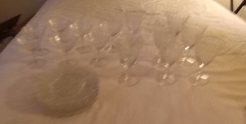 Clear Glass Etched Stemware And Pressed Glass Plates