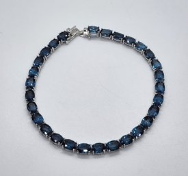 Fabulous London Blue Topaz Tennis Bracelet In Rhodium Over Sterling