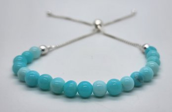 Blue Opal Beaded Bolo Bracelet In Platinum Over Sterling