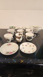 Vintage Teacups And 2 Saucers