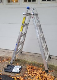 Werner Type 1A Heavy Duty Telescoping Multi Ladder.  Looks To Be Used Once.