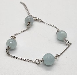 Aquamarine Station Bracelet In Rhodium Over Sterling