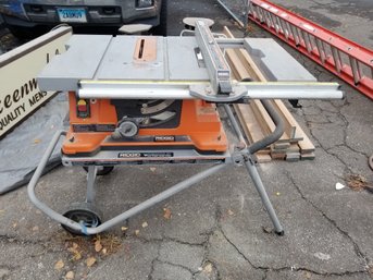 Ridgid Rolling Table Saw Model TS2400-1 With Workin Haul It Folding Rolling Stand