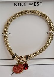 Beautiful Fashion Goldtone Nine West Stretch Bracelet With Red Stone