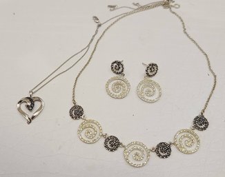 Silver Tone Swirl Necklace And Earring Set Paired With Heart Pendant Necklace