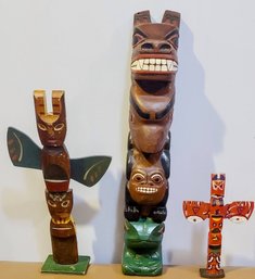 Trio Of Wooden Totem Poles