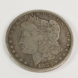 1885-p  Morgan Silver Dollar