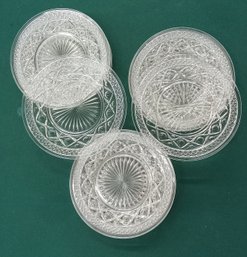 Fourteen Pressed Glass Plates
