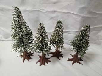 Dept 56 Frosted Norway Pine Trees Set Of 4.  3@7' H, 1@ 9'H