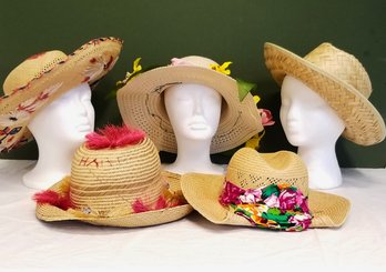 Cute Selection Of Five Colorful Decorated Straw Hats