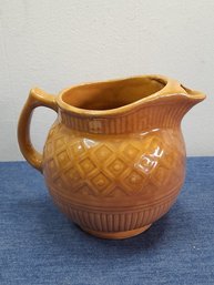 Yellow/Orange Glazed Pottery Pitcher