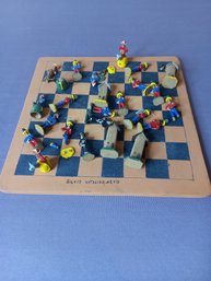 SILVID VITALINO NETO CLAY CHECKER BOARD WITH SCULPTED PIECES