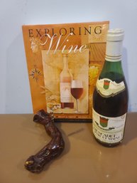 Bottle Of Muscadet From France Paired With Exploring Wine Book And Cool Wood Bottle Opener