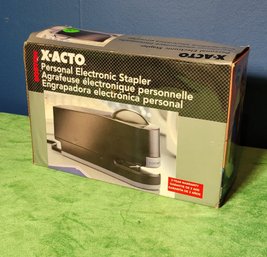 X-acto Electronic Stapler. New In Box - - - - - - - - - - - - - - - - - - - - - - - - - - - - - - Loc: BS#