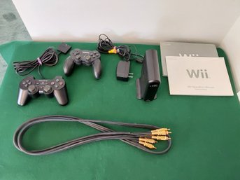 MISC. GAME CONTROLLORS, WII BOOKS AND CORDS
