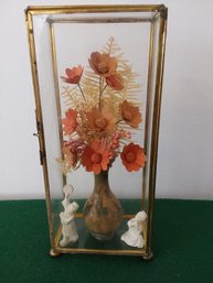 SOUVINER GLASS DISPLAY PIECE WITH FLORAL ARRANGEMENT AND FIGURES