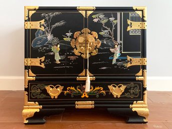 A Vintage Hand Painted Chinoiserie Commode In Campaign Style With Raised Carvings