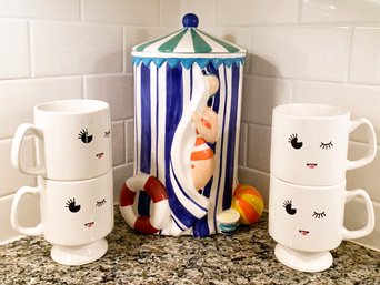 A Ceramic Cookie Jar And Winking Coffee Cups