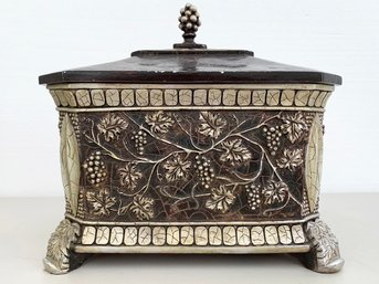 An Ornately Decorated Lidded Urn