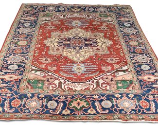 A Large Vintage Heriz (Iranian Tribal) Carpet