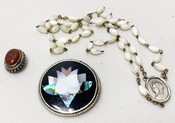 Vintage Pins And A Necklace In Silver Settings