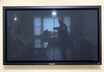 A Panasonic 62' Flat Screen TV On Wall Mount