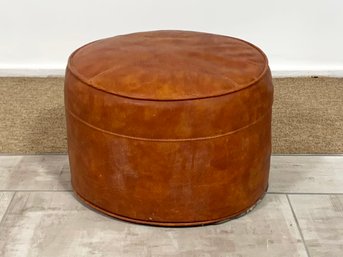 A Vintage Leather Ottoman