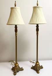 A Pair Of Brass Stick Lamps